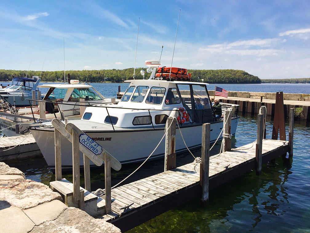 Shoreline Charters in Gills Rock Door County offers lighthouse tours or private charters out to Plum Island