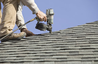 The difference between CFM vs. PSI (nail gun) Nail gun doing roofing work demonstrating PSI vs. CFM