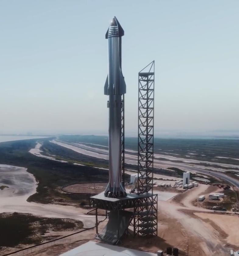 Leaked official render of SpaceX Starship Super Heavy at launch pad in Boca Chica, Texas