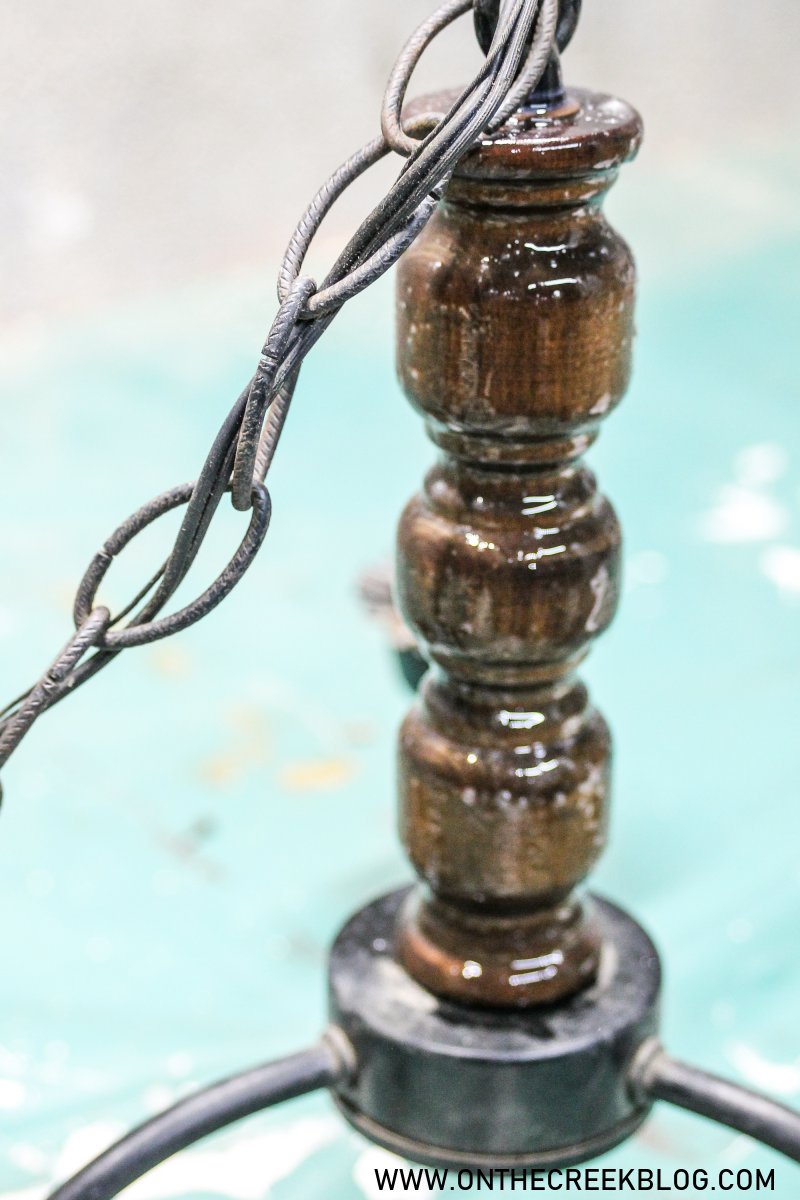 Creating a chippy & distressed solar powered chandelier | On The Creek Blog