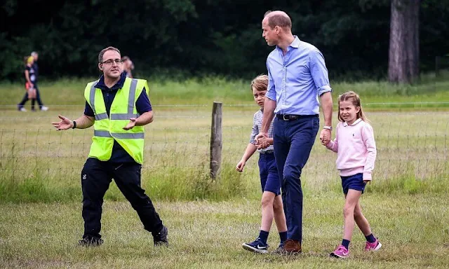 Princess Charlotte wore a pair of denim shorts, and bright pink Nike trainers, and a baby pink sweatshirt by Ralph Lauren