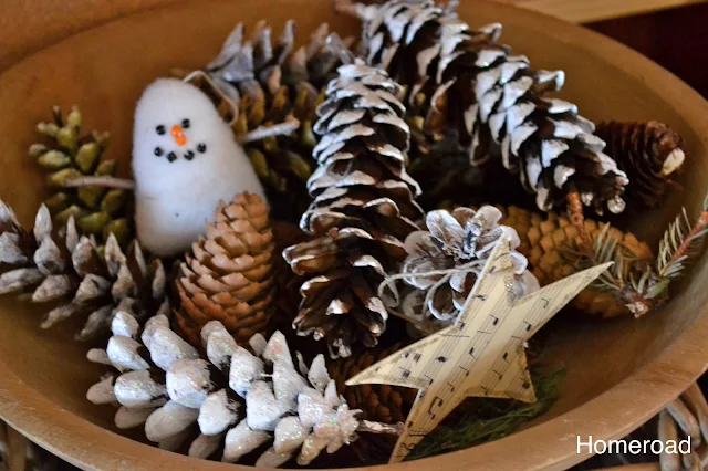 bowl of pinecones and snowman