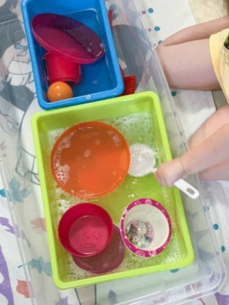washing dishes sensory bin water activity for toddlers