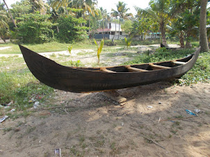 Newly built fishing canoe boat on Marari Beach.
