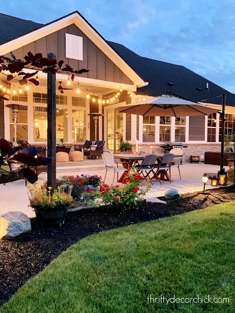 string lights in planters over patio