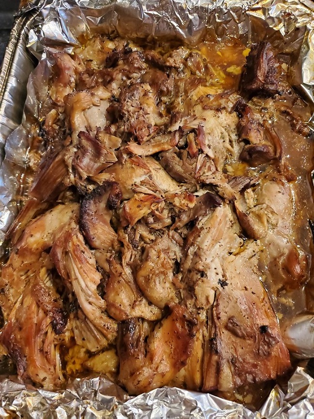 this is oven smoked pork made with liquid smoke recipe and how to make it taste like it was smoked all day. This was cooked in a foil pan