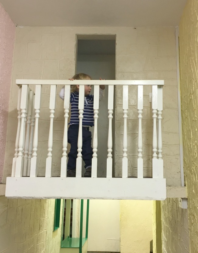 toddler-on-balcony-at--Perrygrove-Railway-Indoor-Village