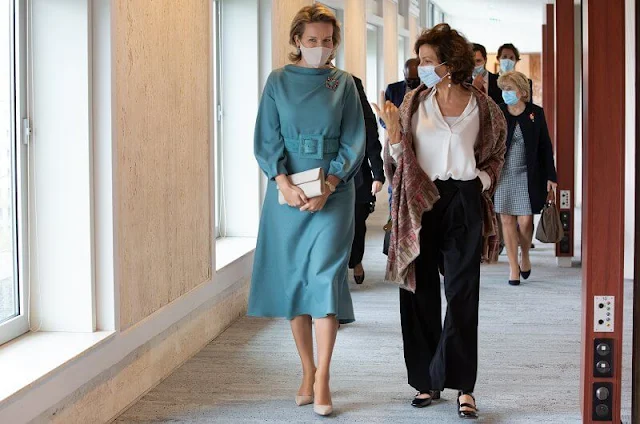 Queen Mathilde wore a turquoise, belted wool cashmere dress from Natan 2021 collection