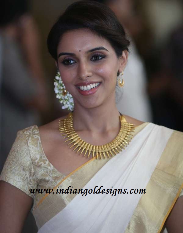Gold and Diamond jewellery designs: Asin in antique gold jewellery