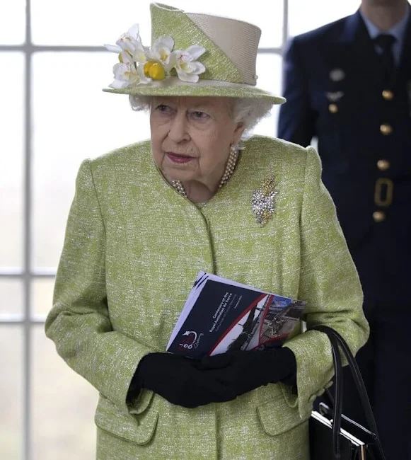 Queen Elizabeth, wearing a lime green coat and the Wattle brooch presented to her on first tour of Australia in 1954