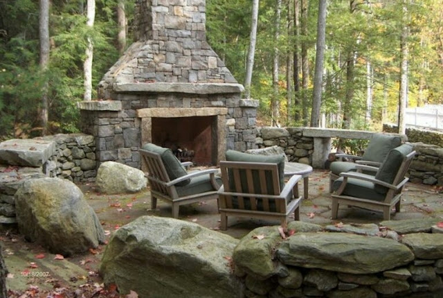 covered outdoor living spaces with fireplace