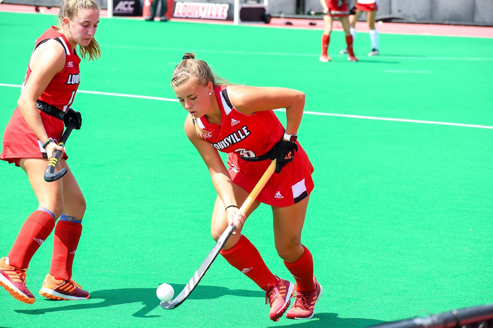 Cardinal Couple Field Hockey Hosts Kent State UofL SAAC