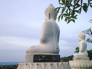 View Of Big White Buddha Statues With Natural Scenery Around At Buddhist Temple North Bali Indonesia