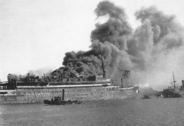 14 May 1940 Statendam on fire rpvided courtesy by Willem van der Leek Books - The Dutch "TITANIC" the second STATENDAM sunken as JUSTICIA