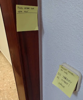 Post-It on doorbell says "Do Not Ring"; Post-It on doorjamb says "You can write a message here"