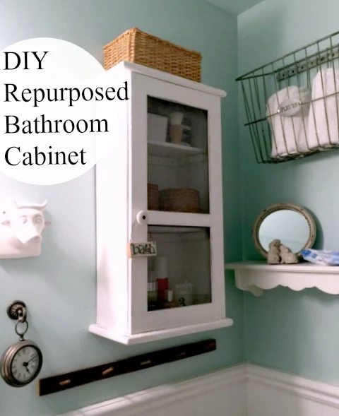 How to Repurpose a Clock into a Farmhouse Bathroom Cabinet www.homeroad.net