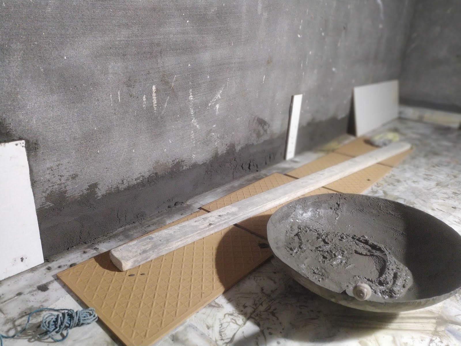 Some tiles work in house. Wall tile work in dressing room and outdoor