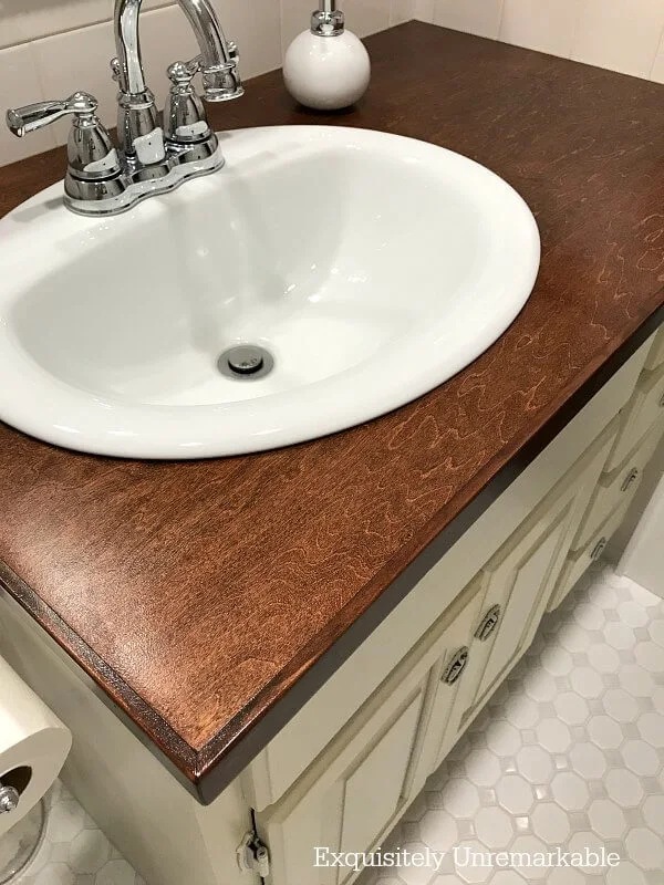 Maple Plywood Countertop with white sink and beige vanity