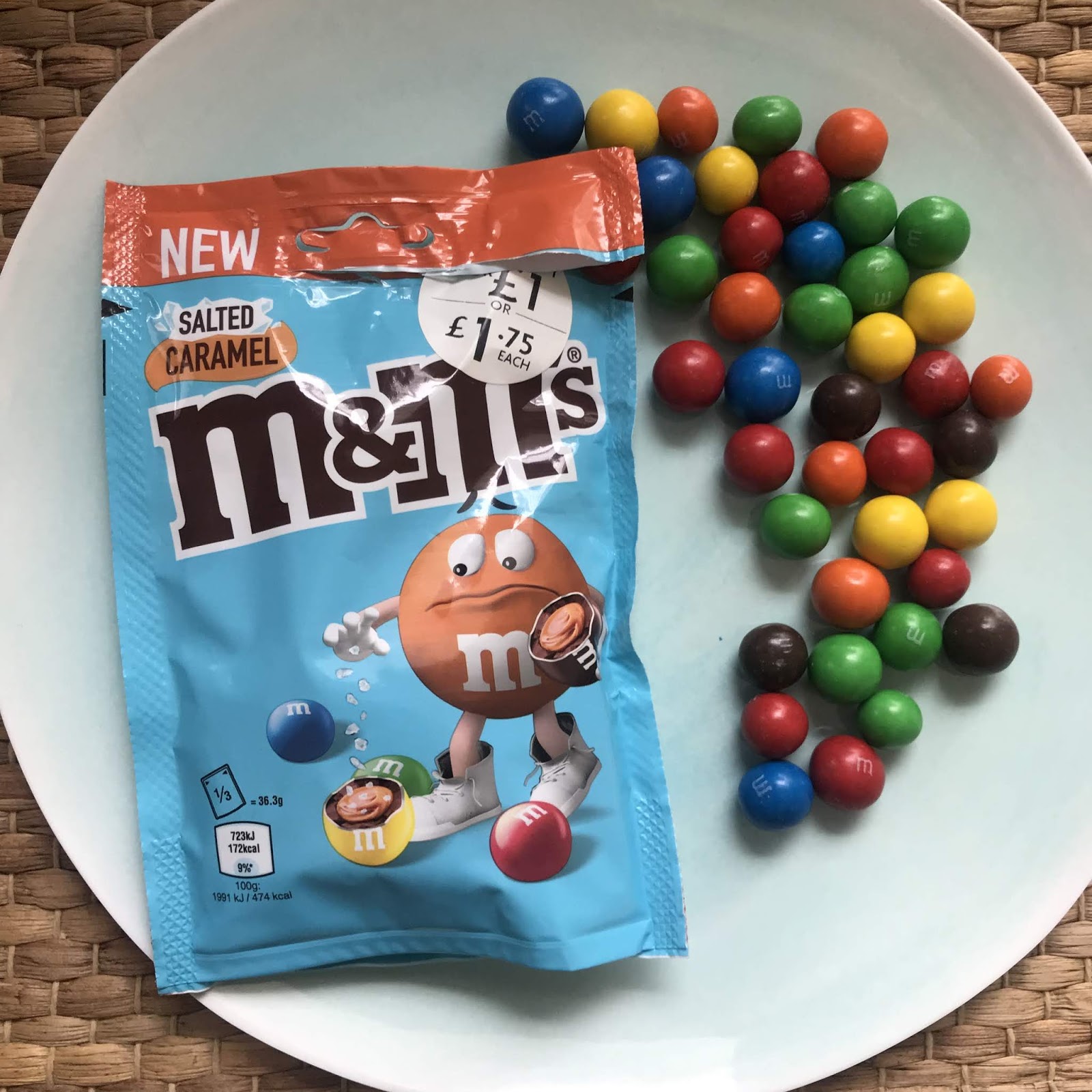Packet of salted caramel M&Ms sweets candies opened with contents