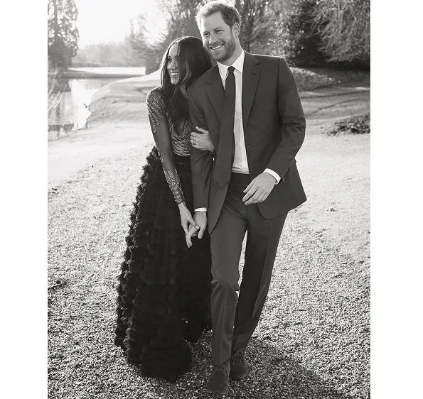 Kensington Palace released two engagement photos of Prince Harry and Meghan Markle. What Meghan wore.