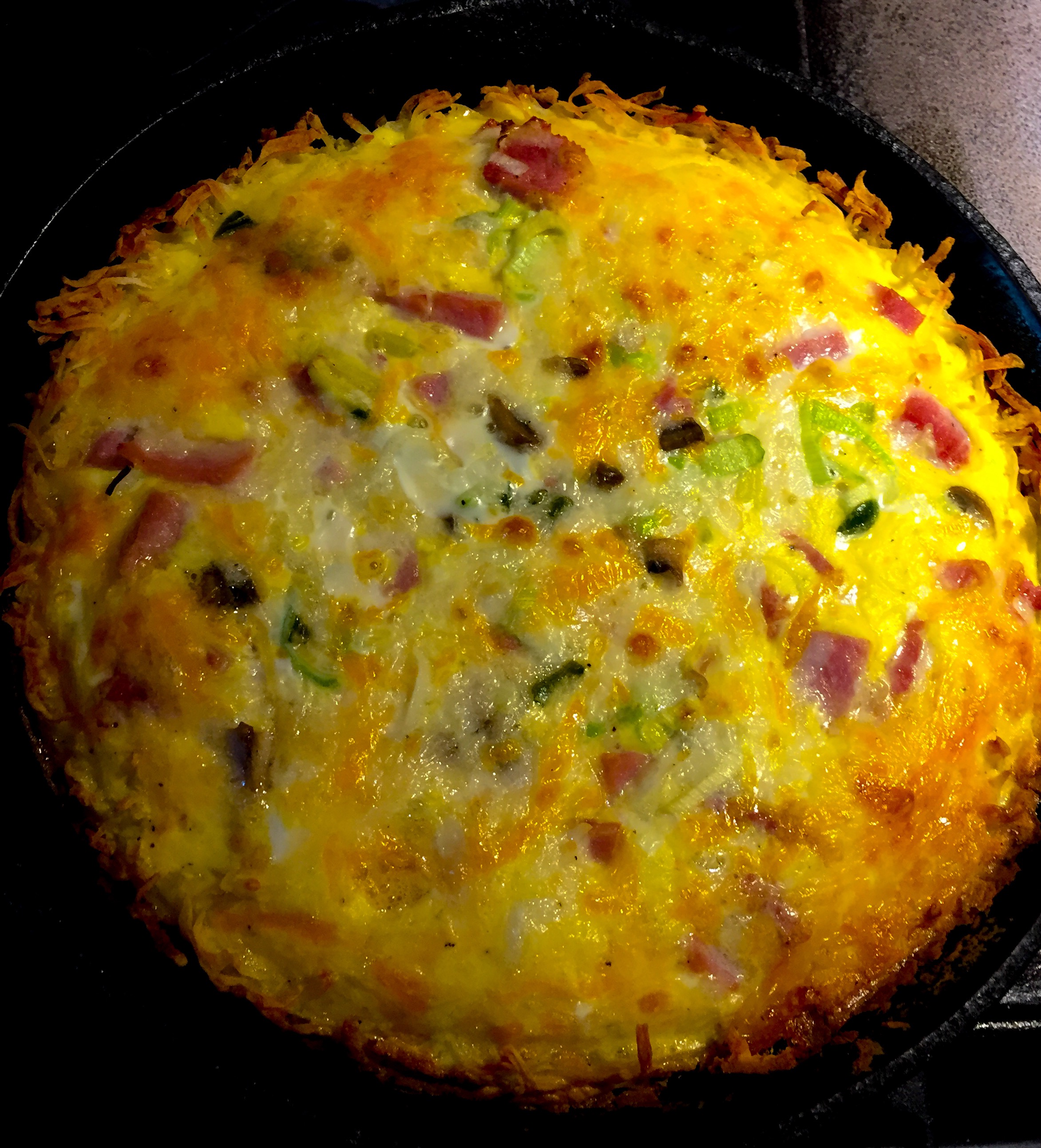 Ain't no cooking like Momma's Hash Brown Crust Cast Iron Ham Quiche