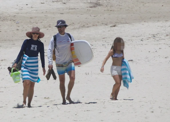 Crown Princess Mary was pictured in the surf with her husband Crown Prince Frederik and their children Prince Christian, Princess Isabella and Princess Josephine.