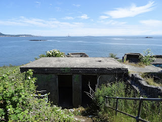 Abandoned concrete WWII buildings on Charles Hill, Aberdour with the blue waters of the Forth in the distance.  Photo by Kevin Nosferatu for the Skulferatu Project.