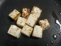 Frying paneer cubes in pan for paneer masala recipe