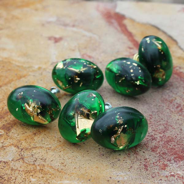 Emerald green resin with gold leaf suspended inside and made into dresser knobs