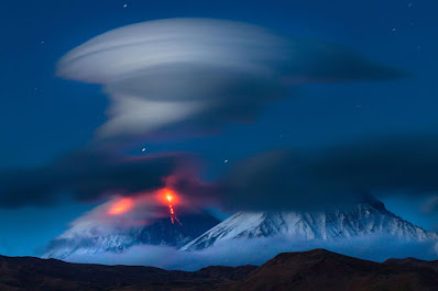 Volcano erupting at night Klyuchevskaya Sopka.  (Photo: Denis Budkov/Caters News)