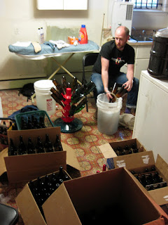 Nathan sanitizing bottles... so may bottles.