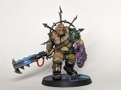 If you watch the video you\'ll see that I do all of this with the Ogryn already mounted on the base. Finished Ogryn front view