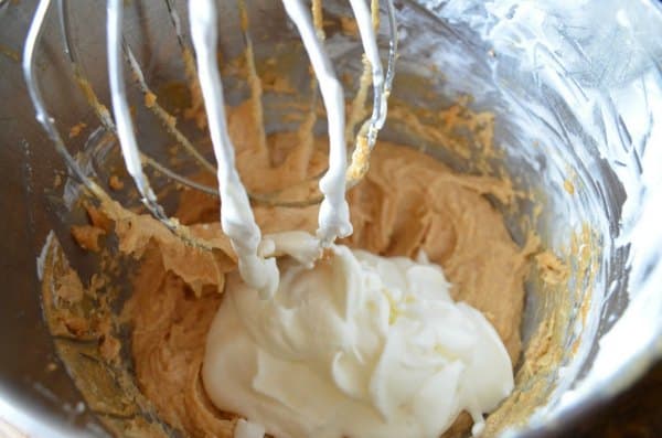 Whipped Cream being beaten into Peanut Butter mixture for No Bake Peanut Butter Fudge Pie.