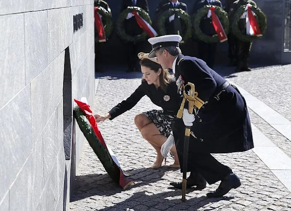 Crown Prince Frederik and Crown Princess Mary attended the traditional wreath-laying ceremony Princess Mary wore Ralph Lauren floral dress