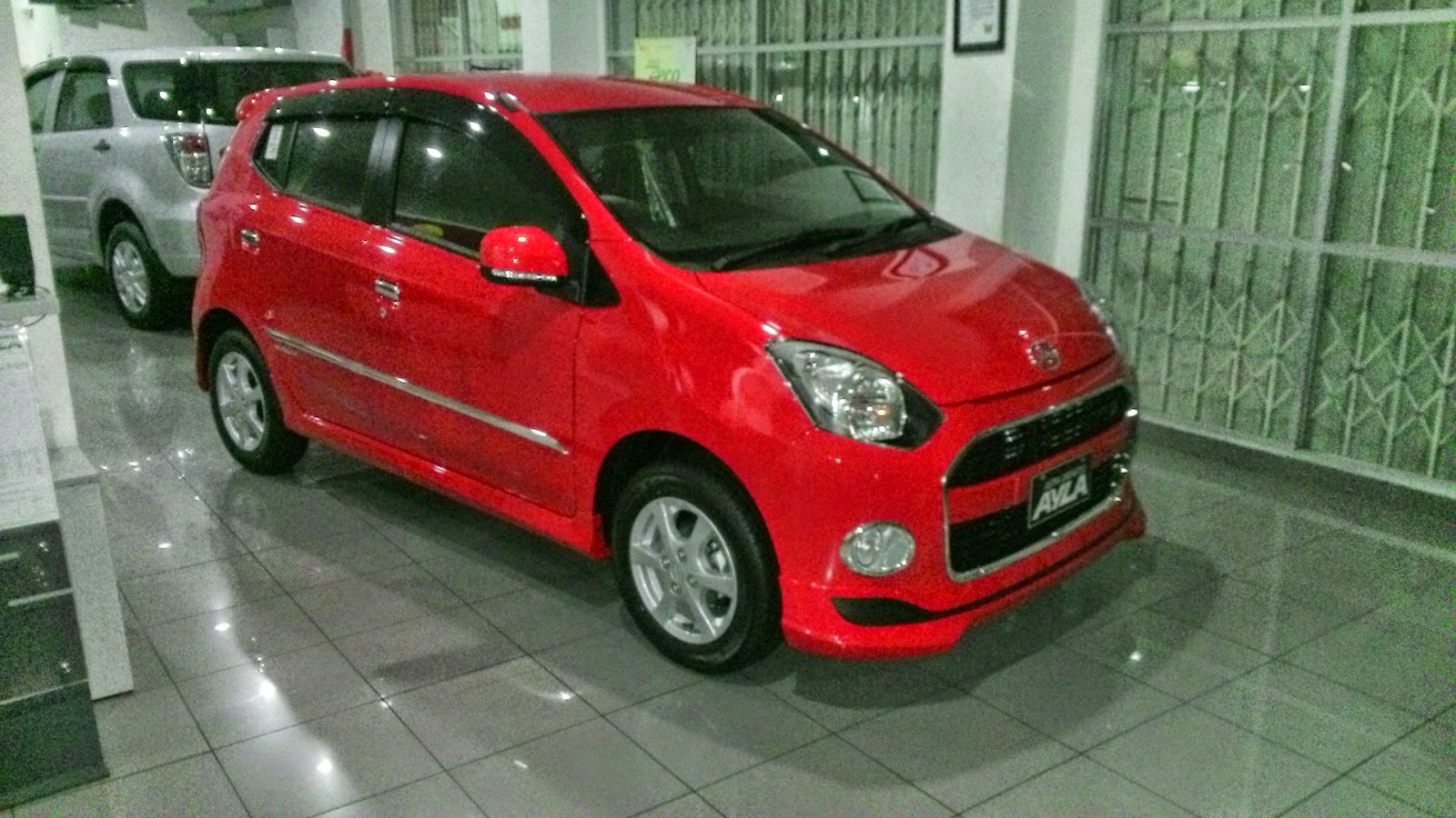 DAIHATSU AYLA MERAH HARGA DAIHATSU JAKARTA BEKASI TANGERANG