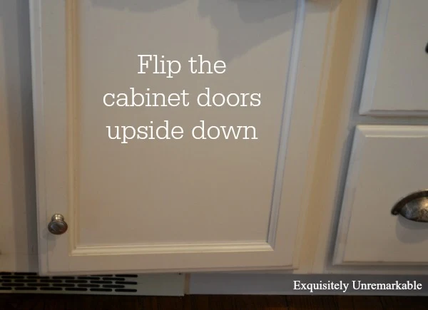 Flip The Cabinet Doors Upside Down text over cabinet photo