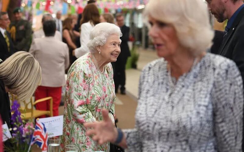 Queen in a floral outfit, Kate  in white coat dress, Carrie Johnson, wore a dressby Vampire’s Wife, Jill Biden in trench coat