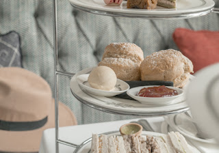 the tasty scones, jam, and cream from an afternoon tea