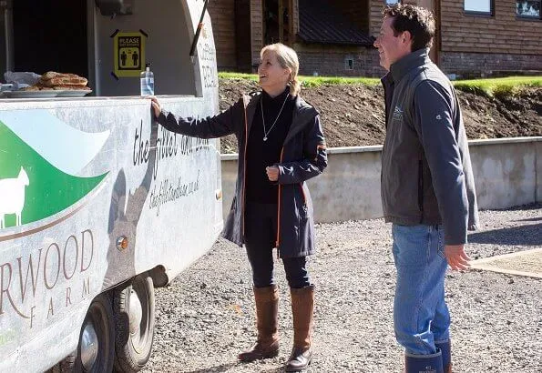 The Countess is patron of the Association of Show and Agricultural Organisations. navy coat and boots. The Countess visited DEBRA store