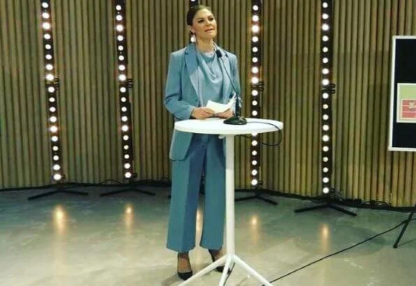 Crown Princess Victoria wore a Narina blazer, Rosaria trousers and Volon mist blue silk top, blouse from Tiger of Sweden