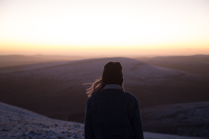 Climbing a Mountain in the Snow The New Year Vlog pen y fan mountain at sunset in the snow girl silhouette mountain