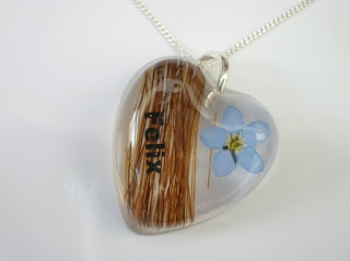 Horse hair and forget me not pendant