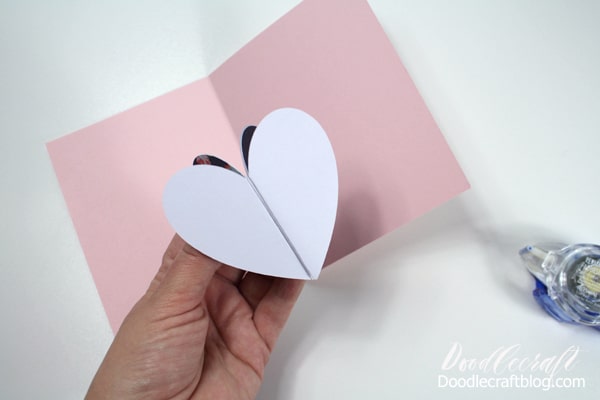 Make a simple pop up card with 3 hearts, folded cardstock and Tombow Adhesive