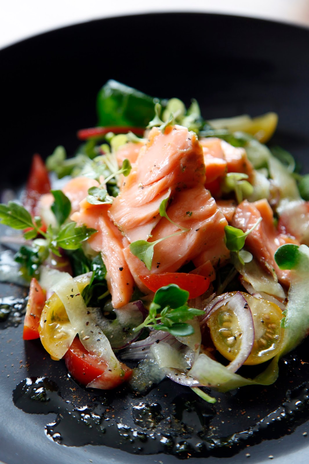 PEBBLE SOUP Irish Confit Salmon with tomato, onion and cucumber salad