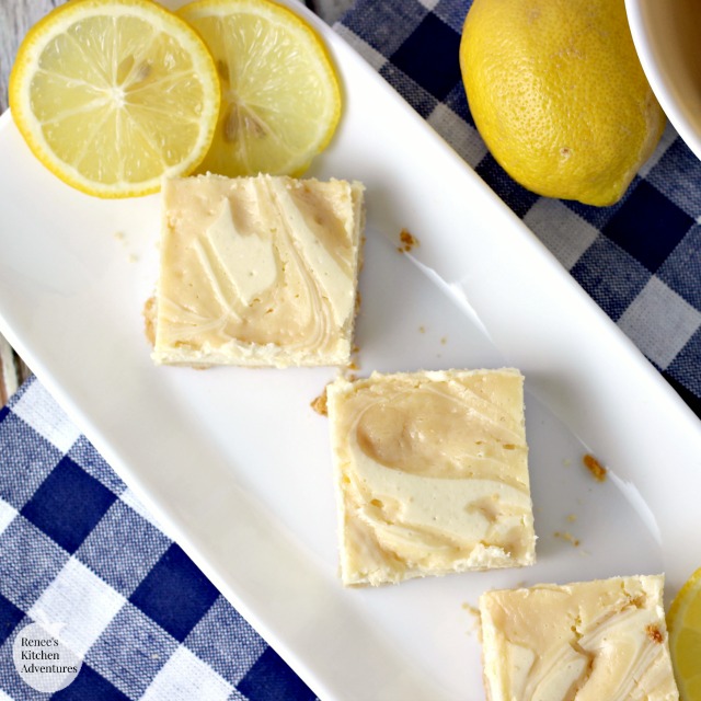 Creamy Lemon Swirl Cheesecake Bars | by Renee's Kitchen Adventures - easy dessert recipe for lemon cheesecake bars #RKArecipes #lemon