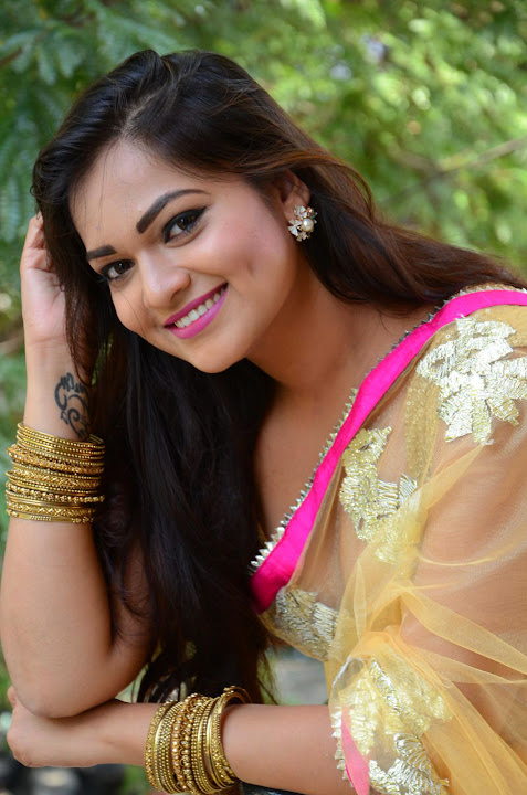 Ashwini Cleavage in Yellow Saree
