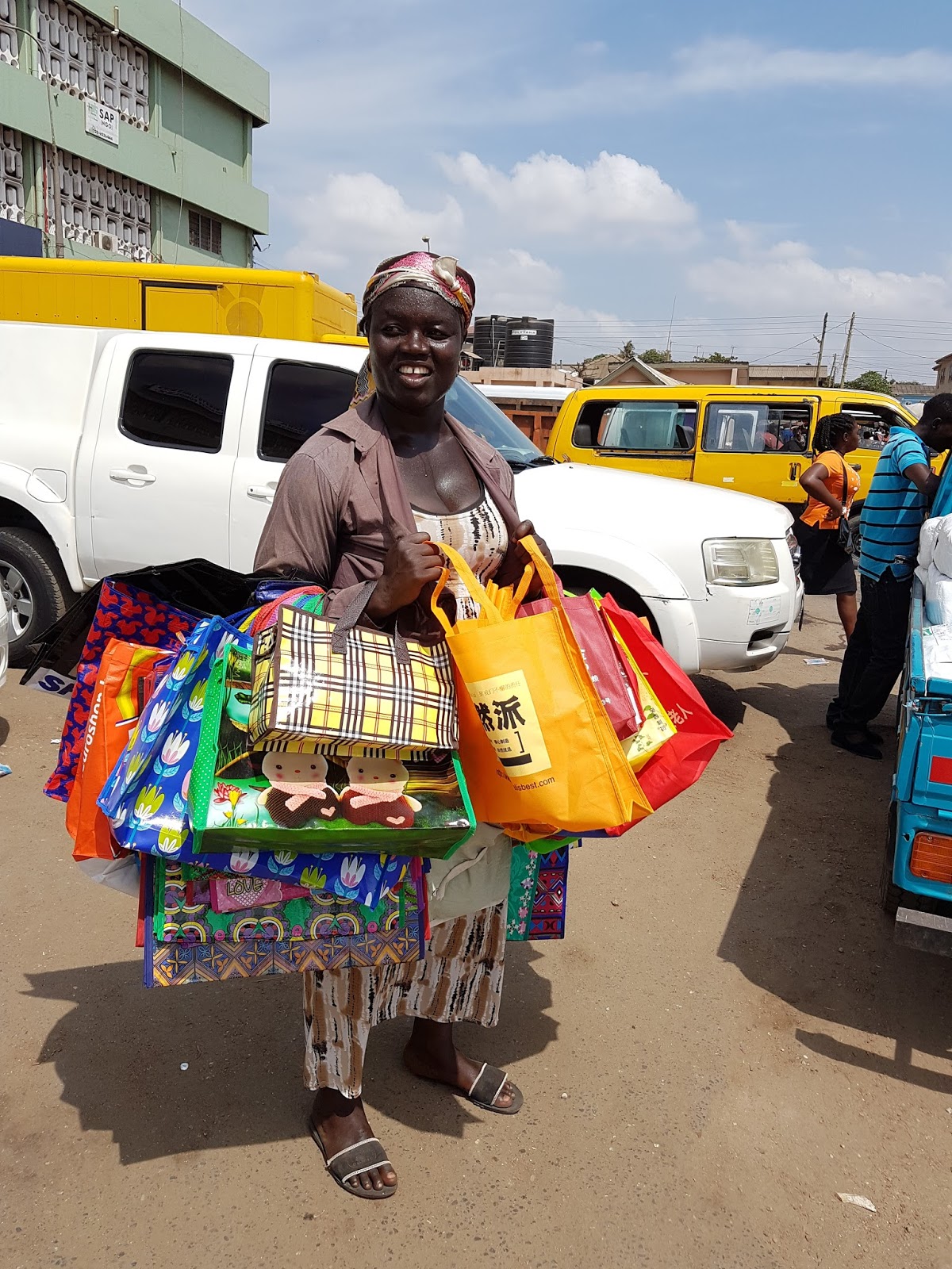 Charlotte... on the go! 'Ghana must go' bags