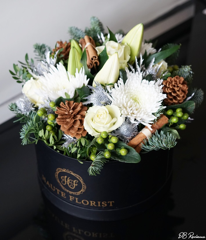 The Holiday hat box bouquet from Prestige Flowers