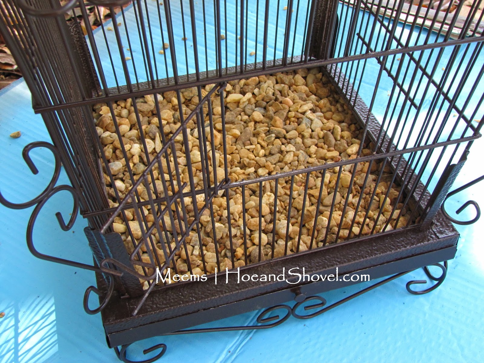 Hoe and Shovel Howto Succulent Planter in a Birdcage