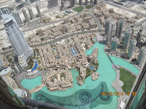 Looking down on skyscrapers from observation deck (124th floor) of Burj Khalifa, Dubai, U.A.E.